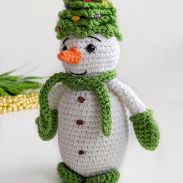Crochet snowman in a Christmas tree hat amigurumi pattern