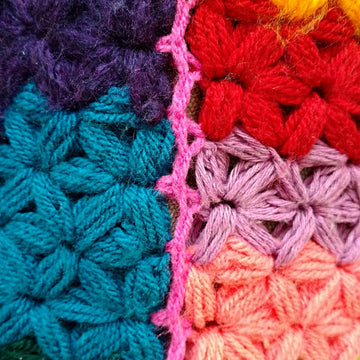 Pillow cover in jasmine stitch