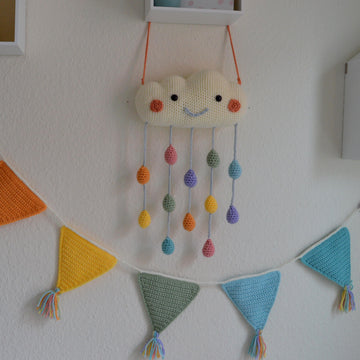 Cloud pillow and mobile with raindrops
