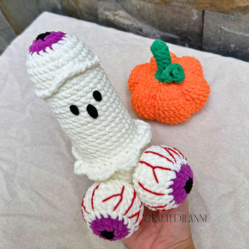 Cheeky ghost with a lift-off pumpkin hat