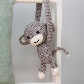 Monkey curtain tie back