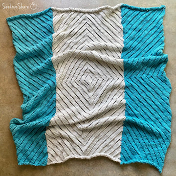 Geometric Eyelet Throw