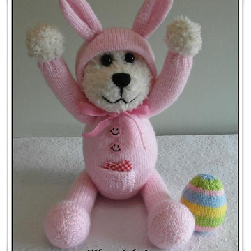 Teddy in a bunny onesie