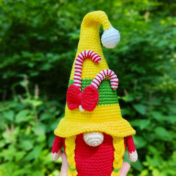 Christmas gnome (girl) with candy canes