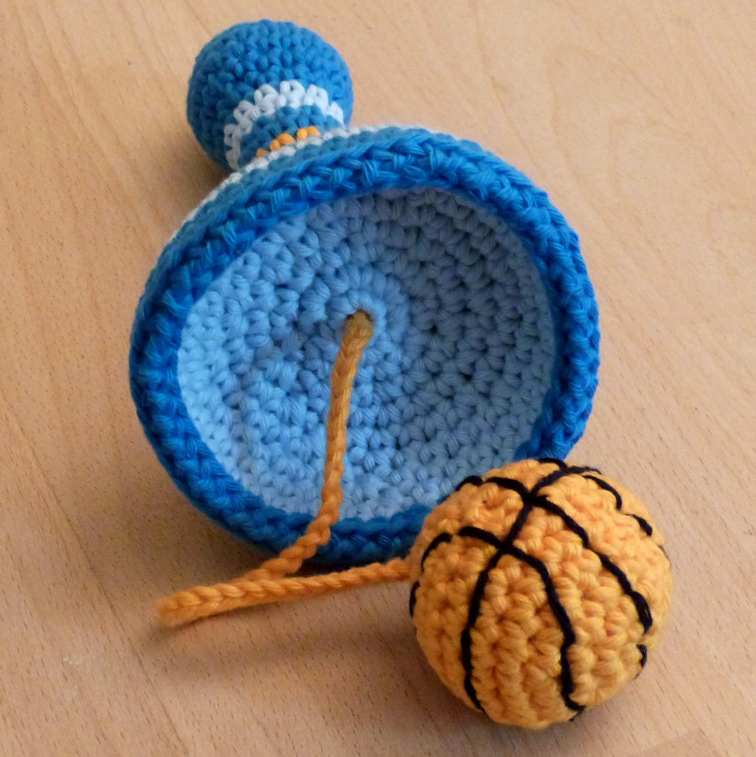 Cup and ball game: basketball