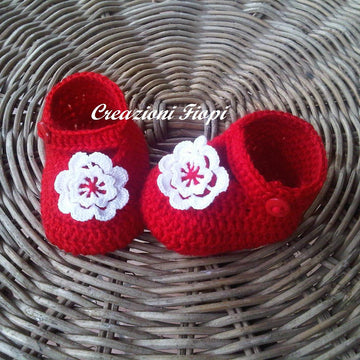 Red baby shoes with flower