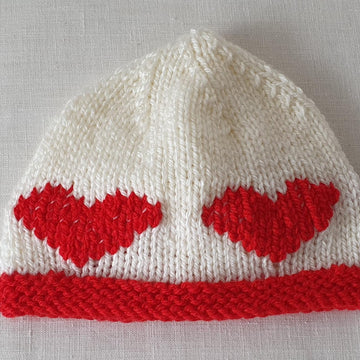 Kaley - Baby’s 8ply beanie with embroidered heart motifs