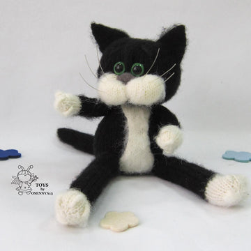 A cat is in an overcoat