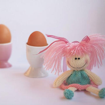 Funny small doll with pink hair for keeping warm breakfast egg