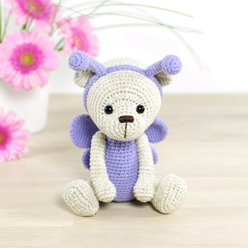 Teddy bear in a butterfly costume