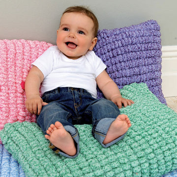 Baby Cushion, Blanket, Playmat & Cot Bumper in Rico Creative Pompon Party - 220 - Leaflet