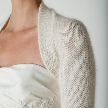 Bolero knitted in one piece