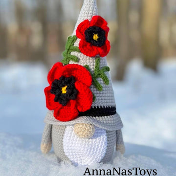 Gnome with poppy flower