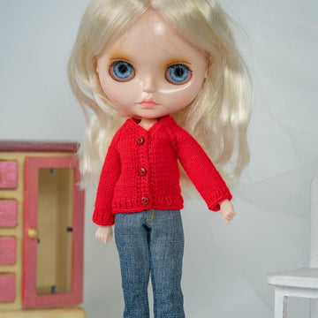 Knitted red cardigan for doll