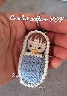 Baby in Cocoon Keychain English_US