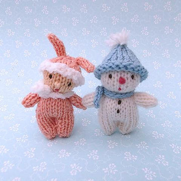 Little snow boy and bunny girl