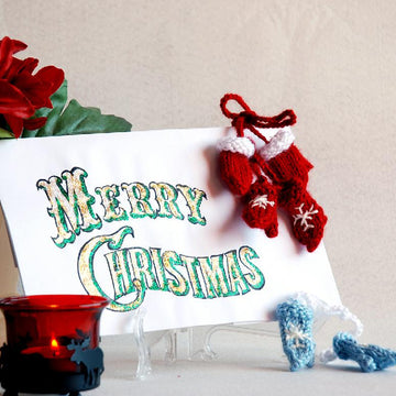 Small mittens for christmas or new year greeting card.