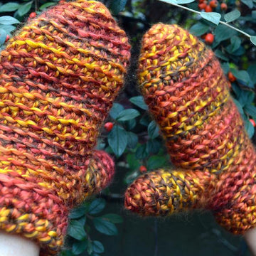 Mittens with a button