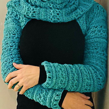 TWO ELEGANT SHAWLS WITH SLEEVES