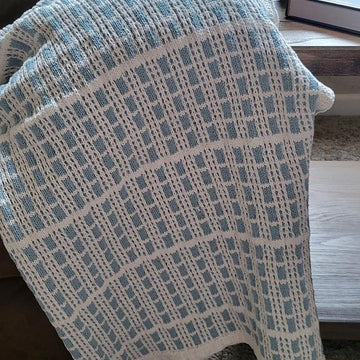 Cosmopolitan Comforter knit throw KNIT
