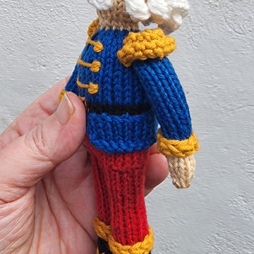 Knitted nutcracker doll