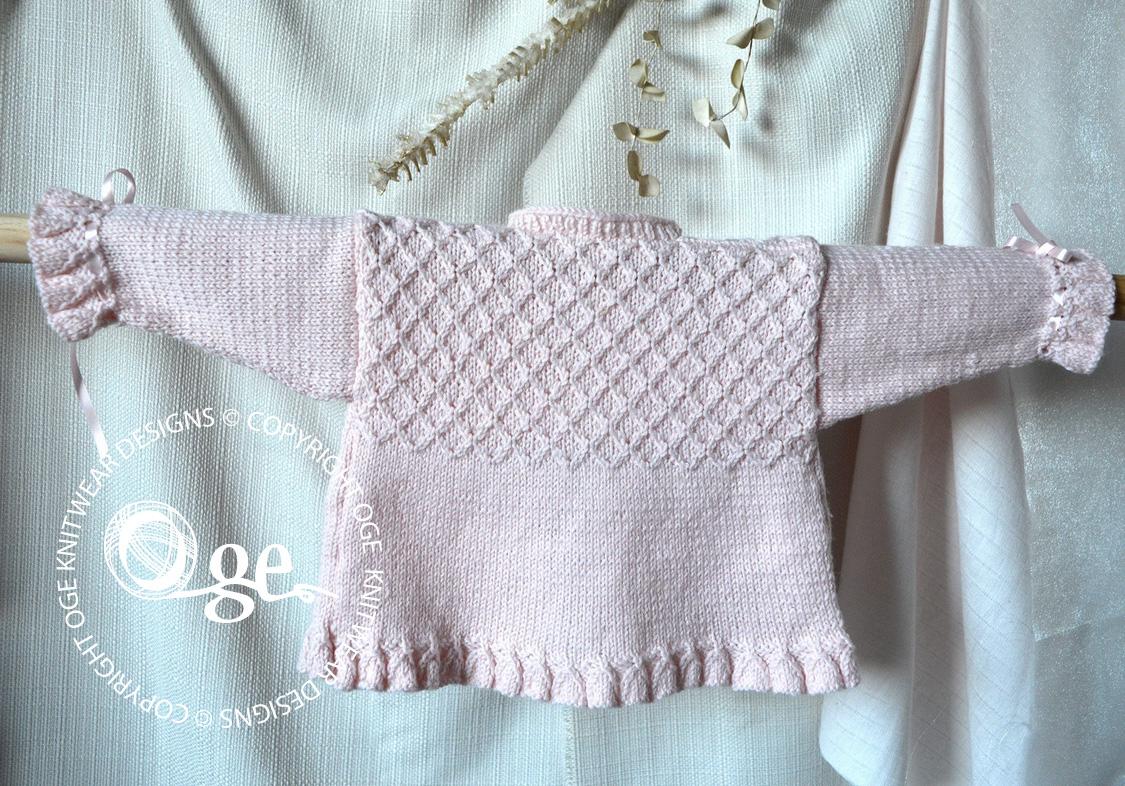 Baby girls sweater with detailed bodice and frilled hemline and cuffs - P025