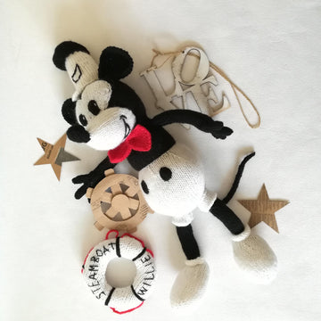 Knitting patterns for Mickey Mouse and Minnie Mouse toys based on Steamboat Willi