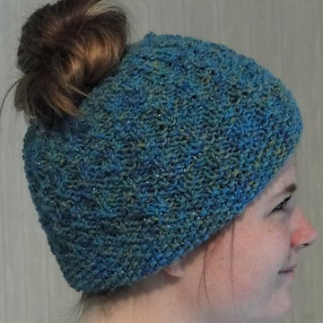 Flo's messy bun hat