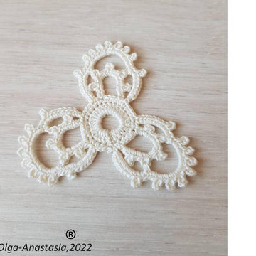 Openwork triangular crochet motif