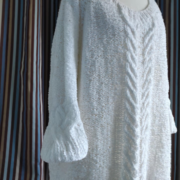 Knitting instructions for a white jumper with cable and twist patterns. Size XXXL.