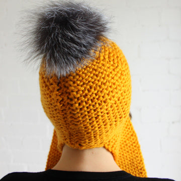 Long Earflap Hat with Faux Fur Pompom