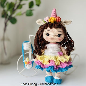July - The unicorn doll